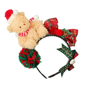 Christmas bear headband with red Santa hat, plaid bow, and Merry Christmas gold ribbons