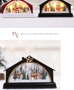 Luminous Christmas desktop ornaments with Santa and reindeer scenes in a cozy warm glow