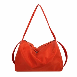 Large orange oxford fabric sports bag with lightweight minimalist shoulder strap design