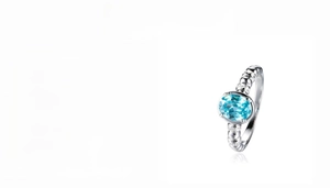 S925 silver ring featuring a 2ct oval neon blue bird nest cut gemstone and micro diamonds
