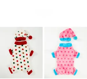 Detailed view of polka dot pattern dog pajamas with matching sleep hats for winter