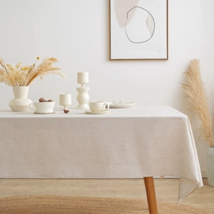 Nordic minimalist beige linen-blend rectangular tablecloth set on a wooden dining table