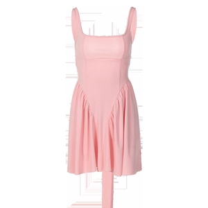 Detailed view of pink bodycon dress featuring pleated hem and elegant hanging ribbon