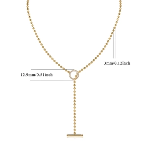 Detail view of gold bead necklace with toggle clasp and dimensions for 3mm beads and 12.9mm ring