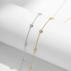 Elegant s925 silver and gold clover necklaces with micro-pave zirconia in a minimalist style