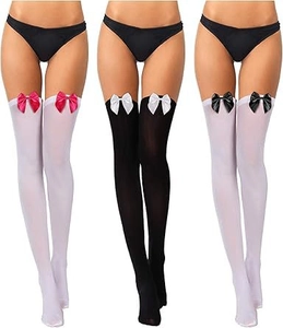 Detail of high stockings featuring velvet bows in white, pink, and black colorways