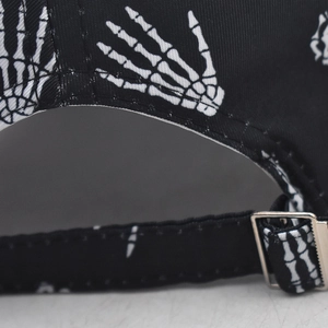 Detail of black baseball cap showing the adjustable metal buckle and stitching on the back
