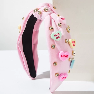 Pink fabric knot headband with rhinestones and colorful heart LOVE charms for Valentine's Day