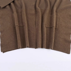 Women's long knit poncho shawl in coffee brown with large functional patch pockets