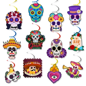 Colorful Day of the Dead Dia de Muertos ceiling hanging swirls with skulls and gravestones
