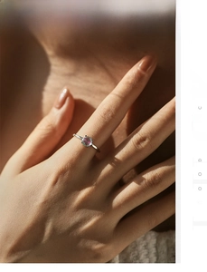 Detailed view of S925 sterling silver ring with a colorful iridescent round zircon stone