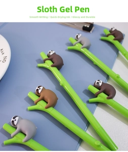 Close-up of cute sloth character pen toppers with green bamboo-style pen barrels