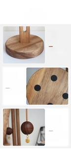 Detail of solid wood paper towel holder with anti-slip pads and decorative leather lanyard