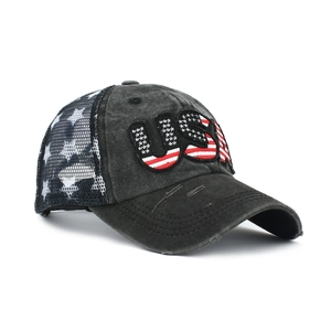 Detail of USA 3D embroidery with American flag pattern on black washed ponytail baseball cap