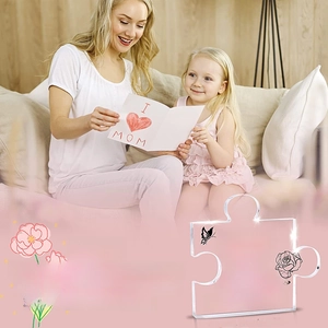 Close-up of acrylic puzzle plaque with floral engraving for Mother's Day gift