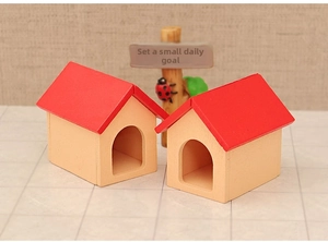 Macro shot of two miniature wooden dog house models with red roofs for DIY decor