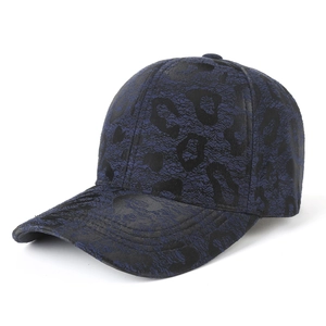 Blue and black leopard print baseball cap with curved brim and textured finish