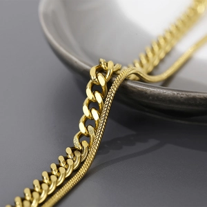Collier double couche en acier titane doré avec maille gourmette et chaîne serpent
