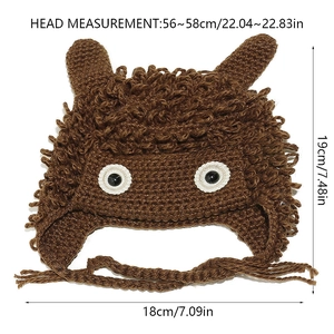 Detail view of brown crochet monster hat with dimensions 18x19cm and earflaps