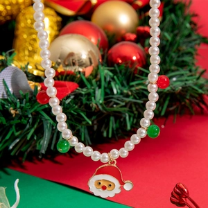 Christmas pearl necklace with Santa Claus pendant and festive red and green bead accents