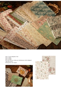 Macro view of vintage floral scrapbooking paper with dried roses and wax seal accents