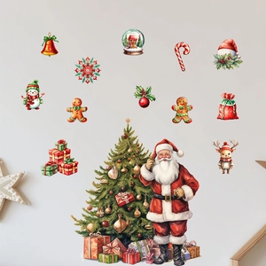 Detailed view of hand-painted watercolor Christmas wall stickers with Santa and reindeer