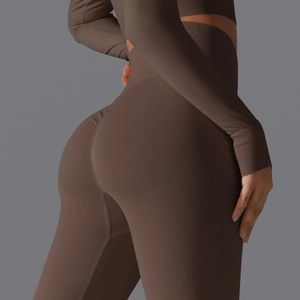 Detailed view of seamless ribbed texture on high waist cocoa brown yoga leggings