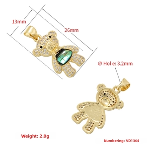 Detailed dimensions of the gold bear charm with zircon, shell inlay and hollow back