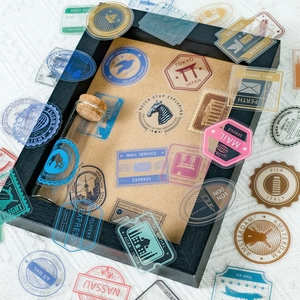 Vintage travel stamp PET stickers featuring world landmarks in a creative display
