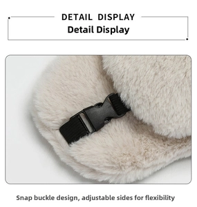 Close-up of fluffy winter trapper hat with adjustable black buckle and durable canvas strap