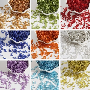 Assorted 2x7mm silver-lined glass bugle beads in 9 vibrant colors for DIY jewelry making