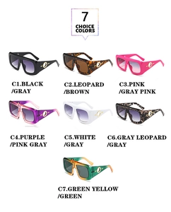 Seven oversized rectangular sunglasses in various colors with golden ring detail