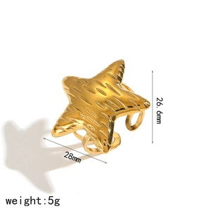 Top view of gold starfish open ring with dimensions 28mm and 26.6mm on white background