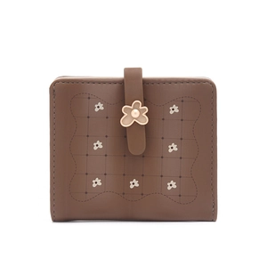Detail of a brown PU leather short wallet featuring floral print and pearl flower clasp