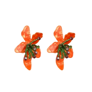 Handcrafted floral bead earrings in vibrant orange and green resin with silver pins