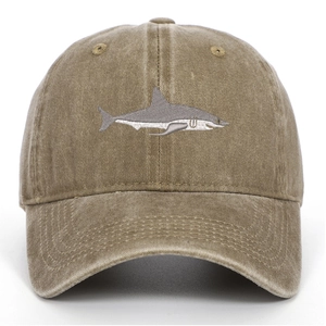 Close-up of shark embroidery on vintage washed cotton baseball cap with detail stitching