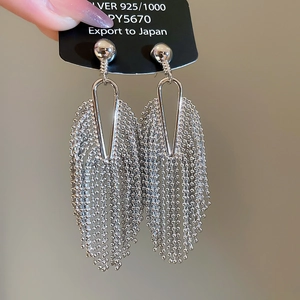 Close-up of 925 silver fringe earrings with layered ball chain tassels for women