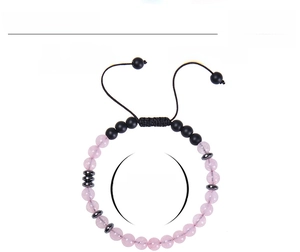 Detail of adjustable Morse Code bracelet with 6mm rose quartz and matte black beads
