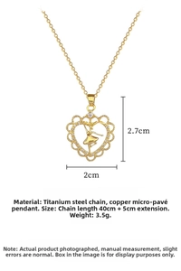 Detail of gold heart pendant with ballerina silhouette and titanium steel chain measurements