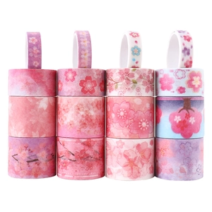 Detailed grid view of 12 floral washi tape rolls with pink cherry blossom and gold foil patterns