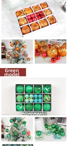Detail of assorted orange-gold and green Christmas ball ornaments in a white gift box