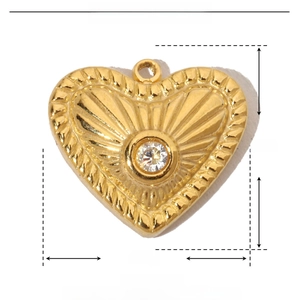 Detailed view of a gold heart-shaped stainless steel pendant with rhinestone and specs