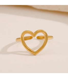 Detailed macro view of gold-plated hollow heart ring with adjustable open band design