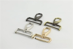 Detail of four swivel lobster clasps in black, silver, gold, and bronze zinc alloy