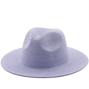 Detail shot of lavender woven straw fedora hat featuring breathable fiber texture