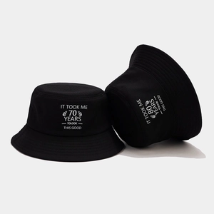 Black cotton bucket hats with 70/80 years birthday slogans and thumb up graphic