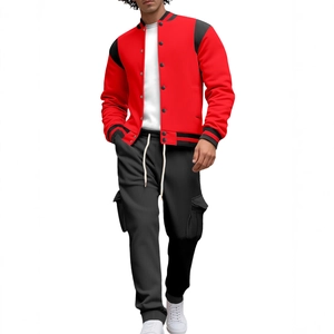 Men's red and black varsity jacket paired with black cargo pants and white sneakers