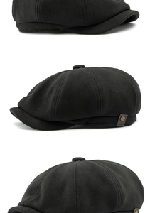 Primer plano de gorra de vendedor de periódicos negra con costura de ocho paneles y remache de metal