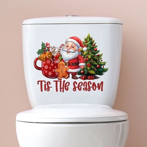 Christmas toilet stickers featuring Santa, trees, and gingerbread men on a white tank