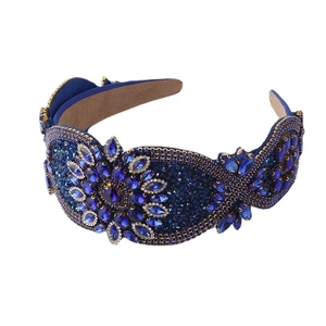 Ornate Baroque wide headband with blue crystals and sparkling floral rhinestone patterns
